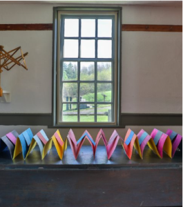 About Prismatic Utopia: A Threefold Exploration of Shaker Color
